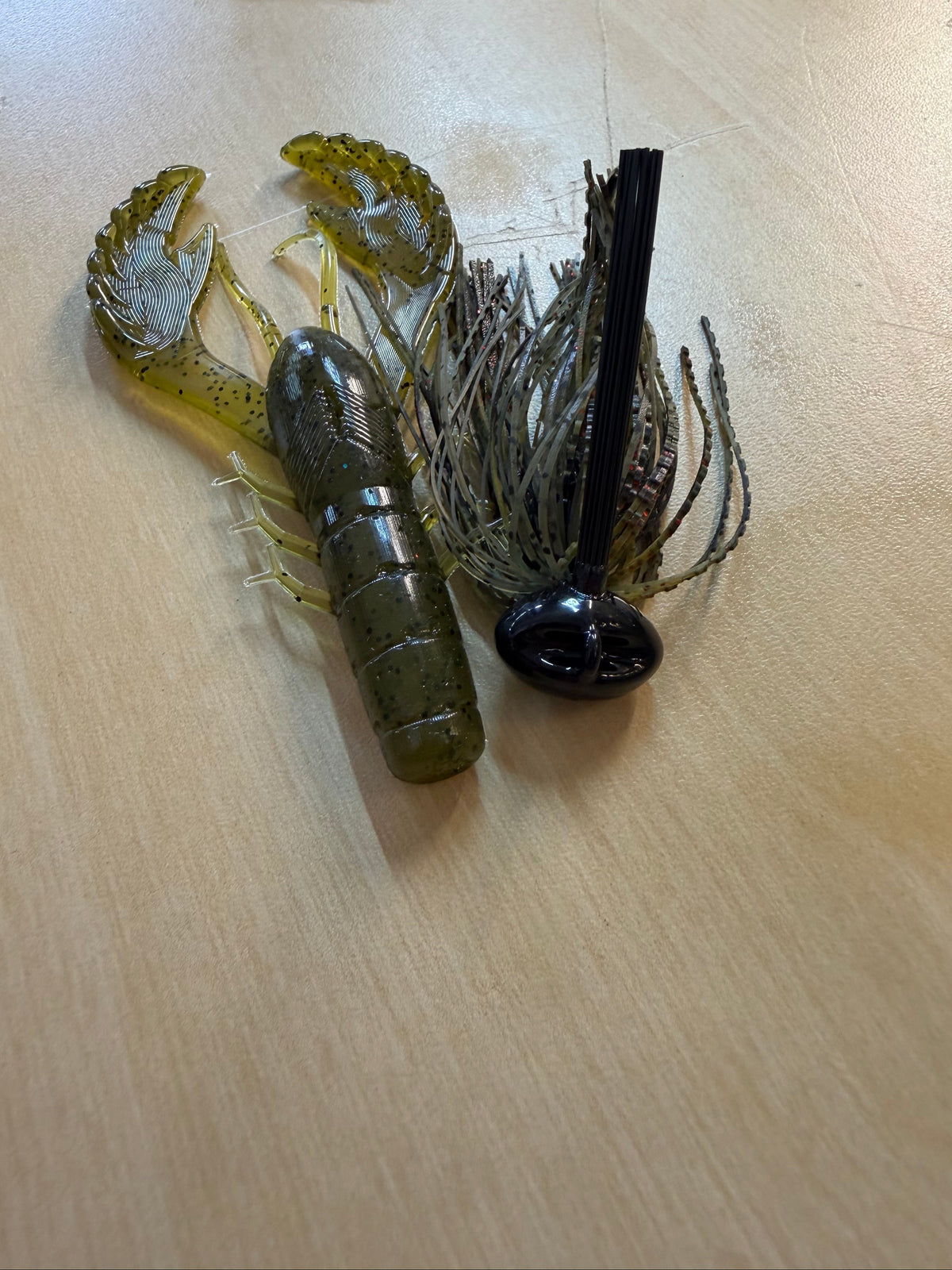 Football jig in green pumpkin with a craw trailer. 