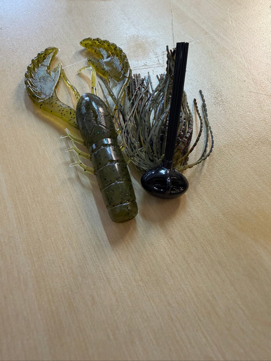 Football jig in green pumpkin with a craw trailer. 